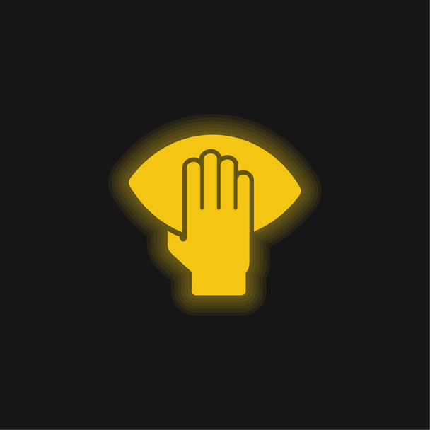 Jogador de futebol americano mão segurando a bola amarelo brilhante ícone de néon - Vetor, Imagem