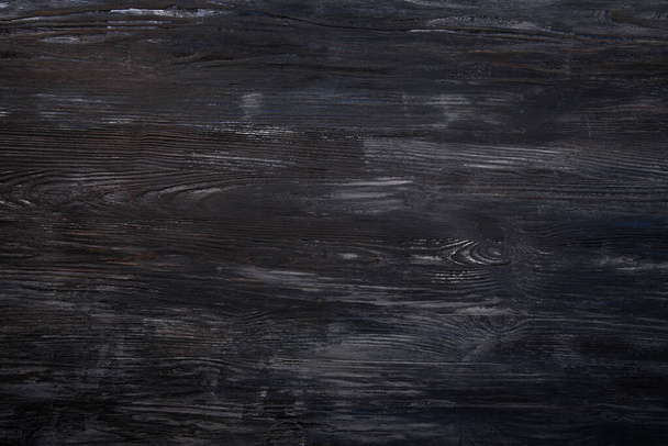 Dunkelgraues Holz Hintergrund Wandstruktur. Ansicht von oben und Kopierraum frei - Foto, Bild