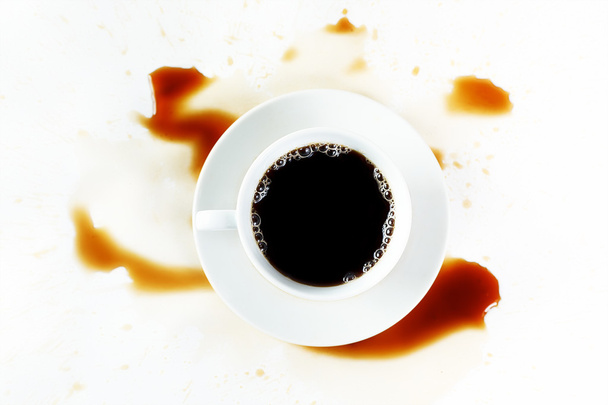 Cup of coffee on white background with stains. Breakfast. - Fotografie, Obrázek
