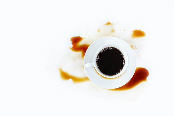 Cup of coffee on white background with stains. Breakfast. - Фото, зображення