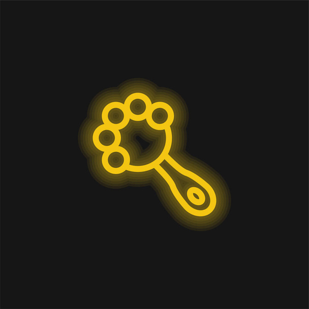 Baby Rattle sárga izzó neon ikon - Vektor, kép