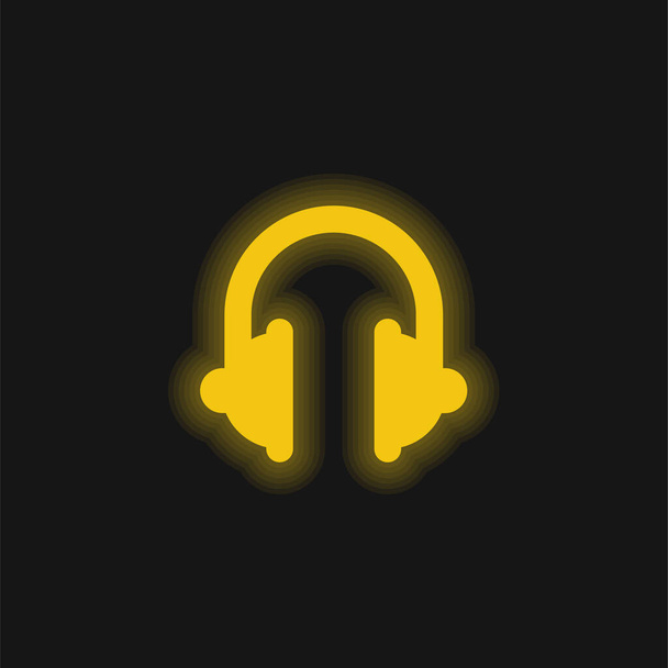 Big Headphones yellow glowing neon icon - Vector, Image
