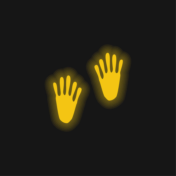 Empreintes animales jaune brillant icône néon - Vecteur, image
