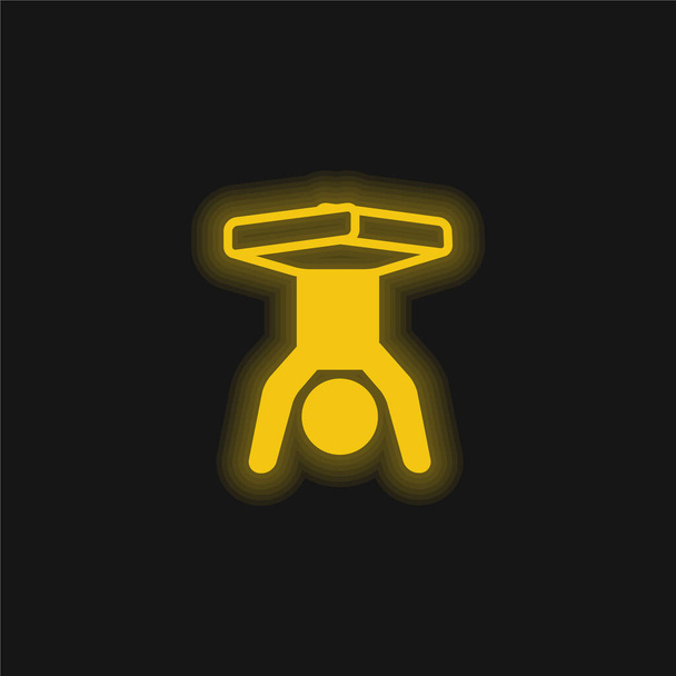 Boy Handstands With Legs Flexed yellow glowing neon icon - Vector, Image