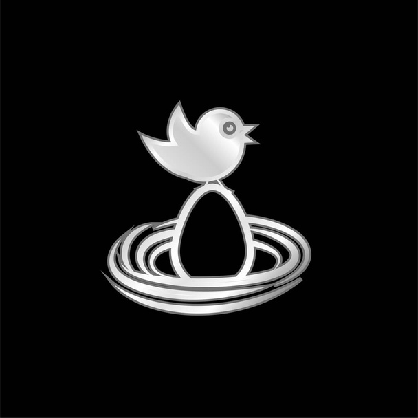 Bird On An Egg In A Nest silver plated metallic icon - Vector, Image
