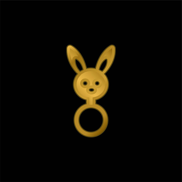 Rattle bebé con cabeza de conejo forma chapado en oro icono metálico o logo vector - Vector, imagen