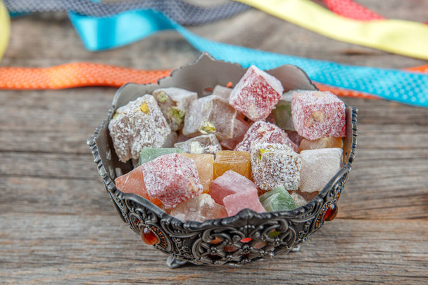 Turkish delight colorful jelly cubes called lokum. Variety of Turkish Delight Lokum Sweet Turkish delight lokum Traditional dessert. - Photo, Image