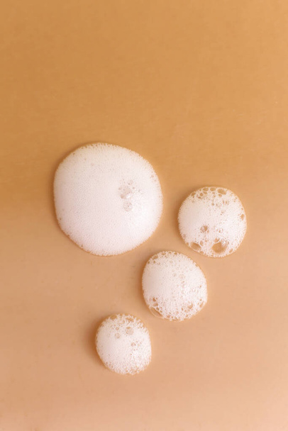 Cosmetic cleaning foam texture on neutral background - Valokuva, kuva