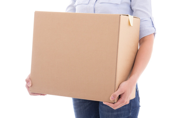 cardboard moving box in woman hands isolated on white - Fotoğraf, Görsel