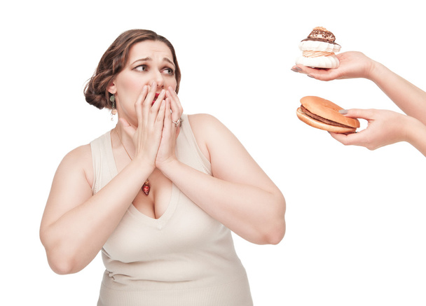 Plus size woman fearing unhealthy food - Photo, Image