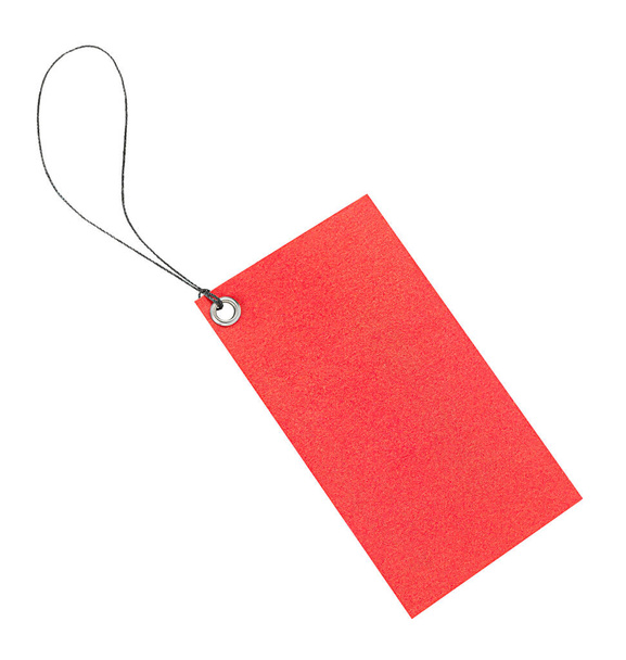 rood etiket op witte geïsoleerde witte achtergrond - Foto, afbeelding