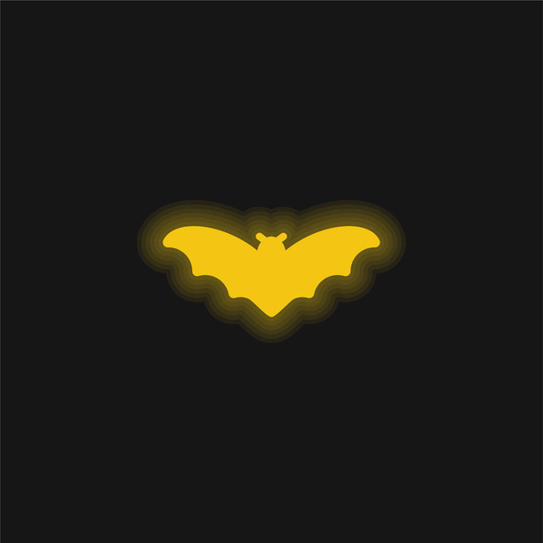 Ícone de néon brilhante amarelo morcego - Vetor, Imagem