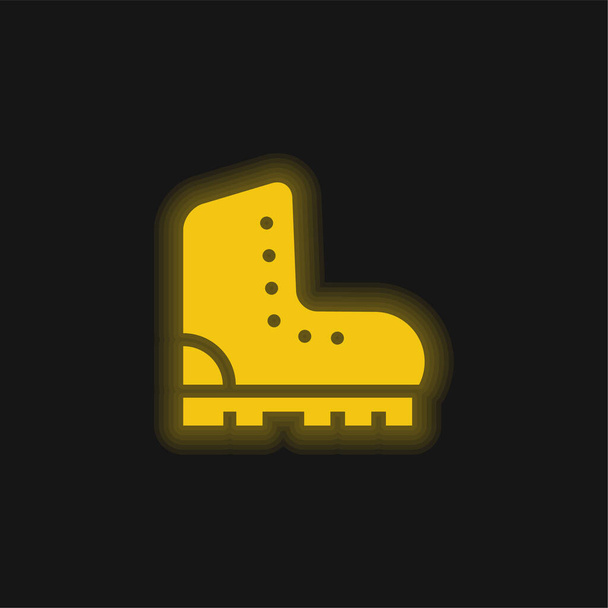 Botas amarelo brilhante ícone de néon - Vetor, Imagem