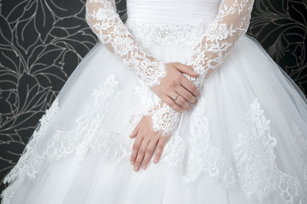 Lace white wedding dress with long sleeves - Zdjęcie, obraz