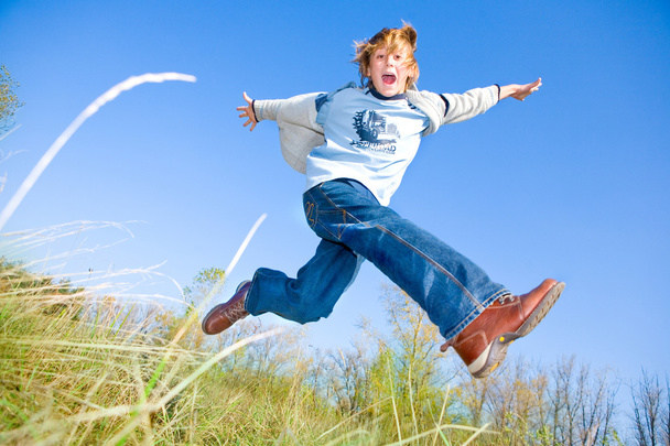 Happy jumping boy - Photo, image