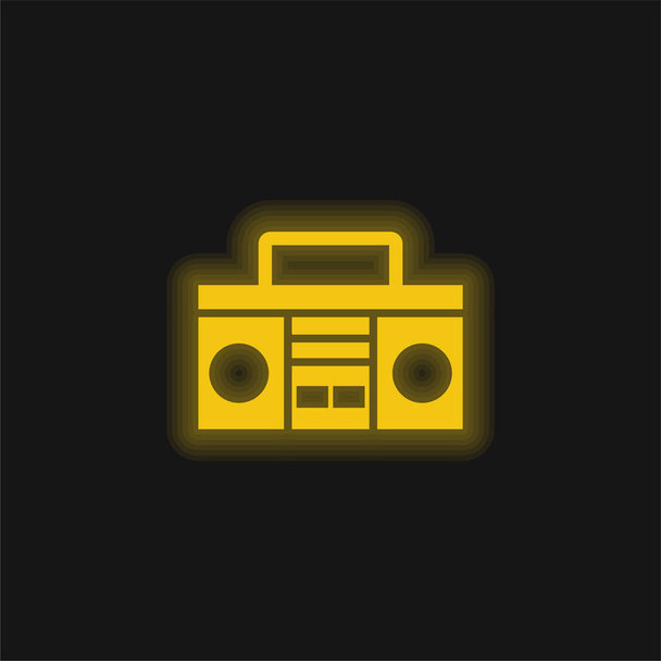 Boom Box s rukojetí žlutá zářící neonová ikona - Vektor, obrázek