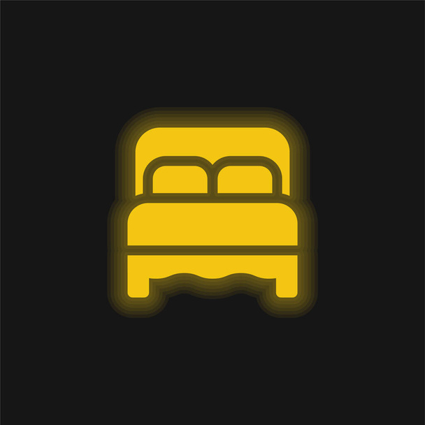 Cama amarela brilhante ícone de néon - Vetor, Imagem