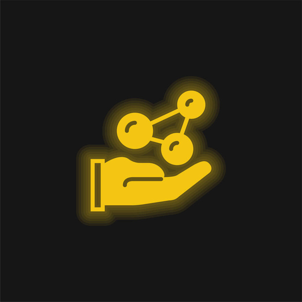 Atoms yellow glowing neon icon - Vector, Image