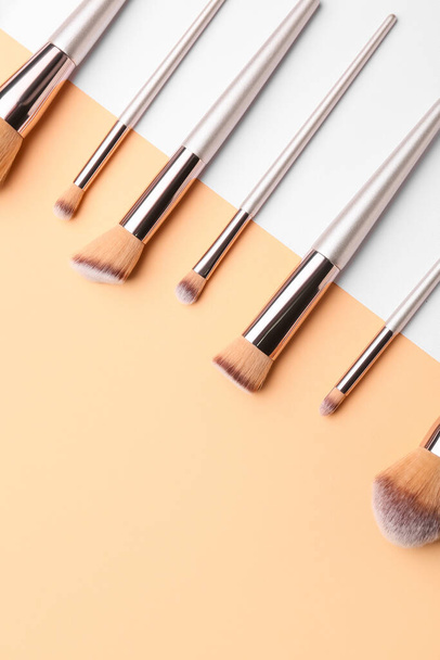 Set of makeup brushes on color background - Photo, Image