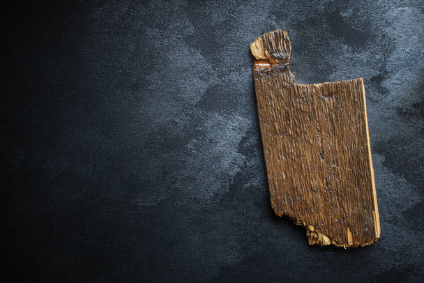 cutting board on black background, top view - Photo, Image