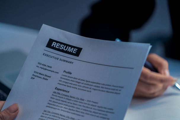 Human resources department manager reads CV resume - 写真・画像