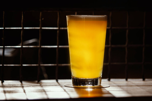 Craft Beer in Bar, Glass on table in authentic Pub - 写真・画像