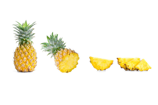 Collection of sliced pineapples and pineapple isolated on white background - Photo, Image