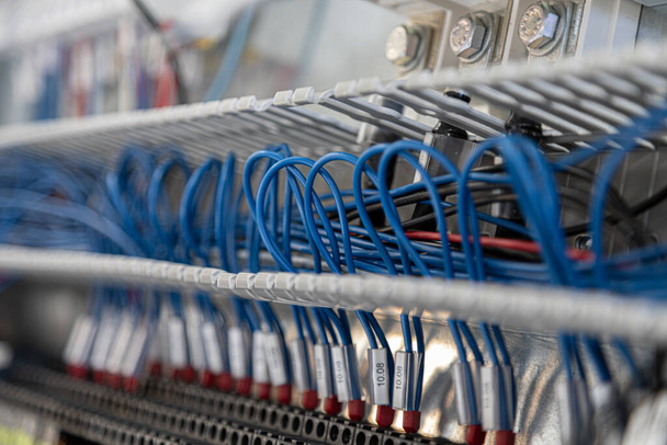 A closeup shot of blue cable networks - Fotó, kép
