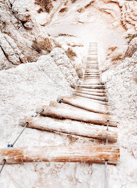 A vertical shot of Hike the Notch Trail Stairway in South Dakota Badlands - Foto, imagen