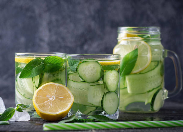 Summer cucumber lemonade with lemon and mint. Cold drink lemonade - Photo, Image