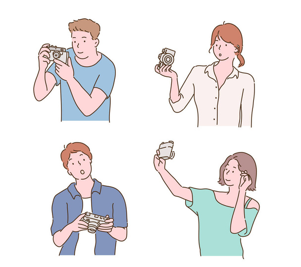 Collection of people holding cameras. hand drawn style vector design illustrations. - Vector, afbeelding