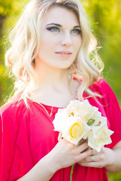 Portrait of a beautiful young blonde woman - Foto, Imagen