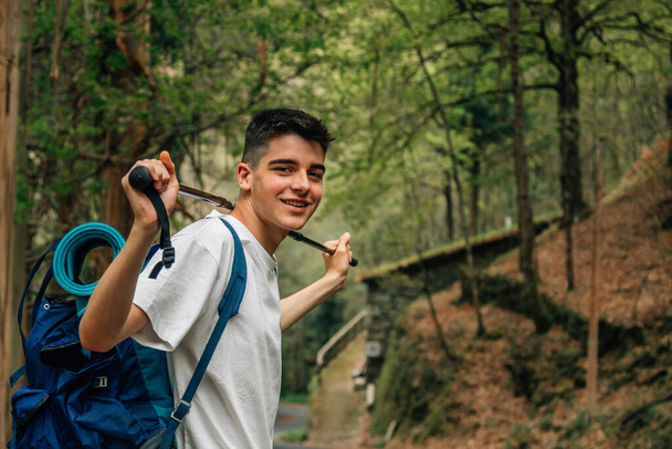 boy with backpack hiking or pilgrimage - Photo, Image