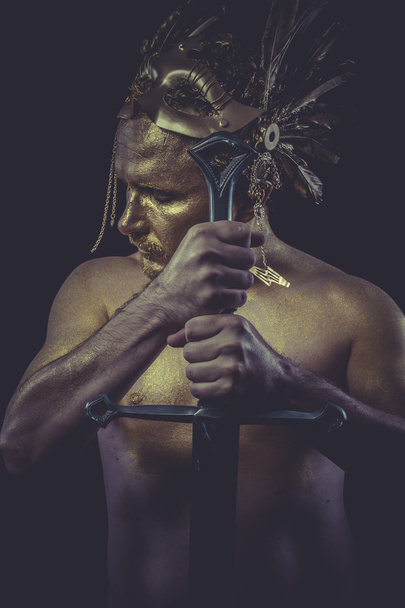 Man with body painted gold - Fotó, kép