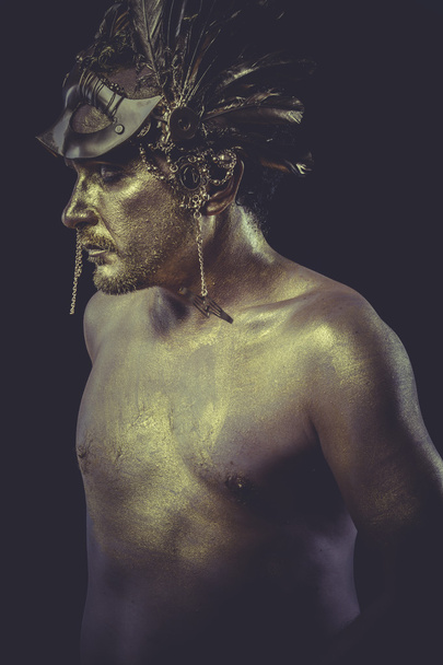 Man with body painted gold - Фото, зображення