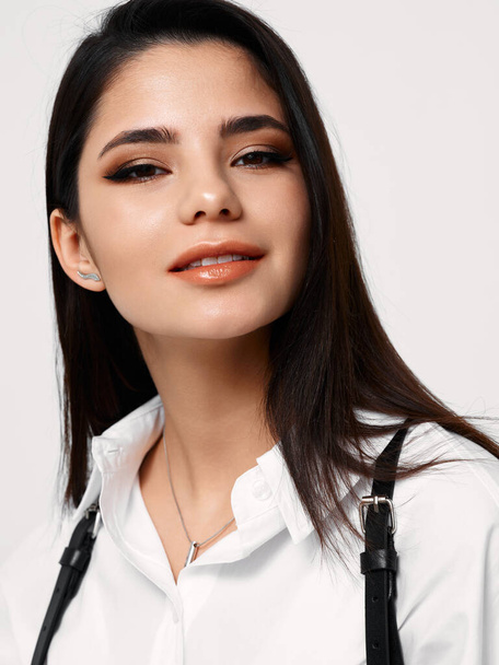 happy model in white shirt evening makeup cosmetics brunette - Valokuva, kuva