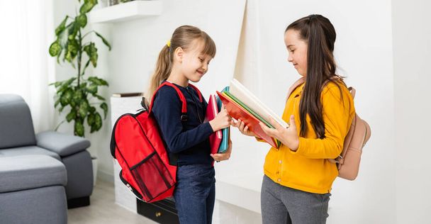 Kids going to school schoolgirls with backpacks, fancy girls concept - Foto, Imagem