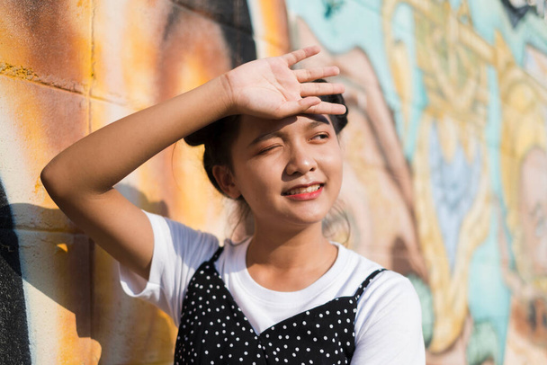 Portrait young girl with a colorful background, Asian girl, Happy girl. - Foto, afbeelding