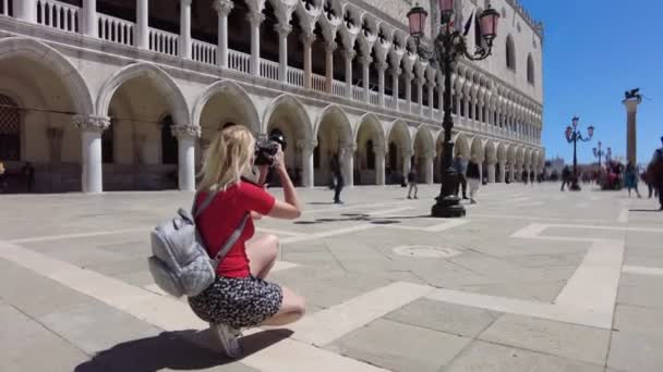 girl taking pictures in Saint Mark - Footage, Video