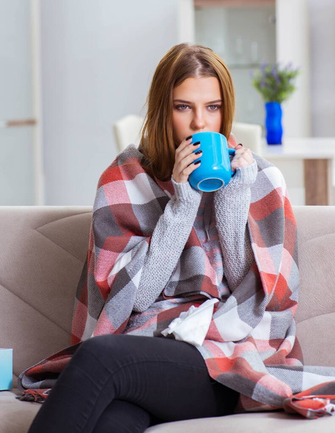 Sick woman suffering from flu at home - Фото, зображення