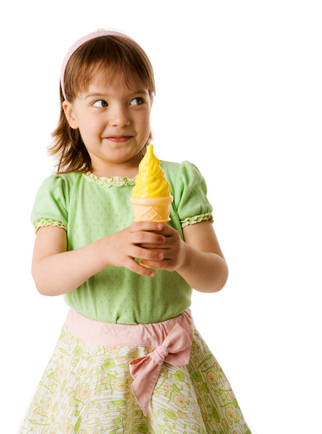 Little girl eating tasty Ice-cream isolated on white - Fotoğraf, Görsel