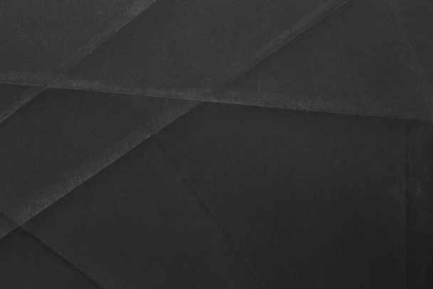 Zwarte papieren textuur als achtergrond - Foto, afbeelding