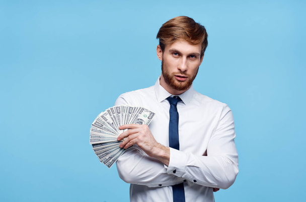 Virgo man in tie with money in hands wealth success self-confidence - Foto, Imagen