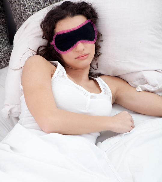 Woman sleeping in bed - Foto, afbeelding