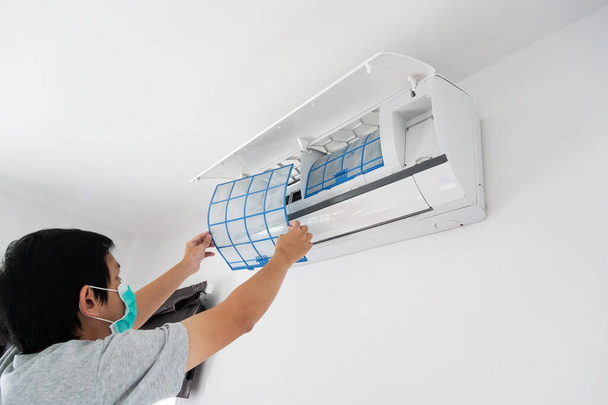 man hand hold air conditioner filter cleaning concept - Photo, Image