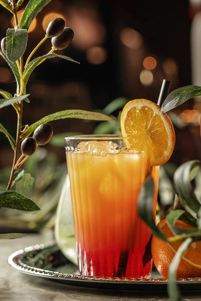 Aperol Spritz orange cocktail with slices of orange on silver tray - Foto, imagen