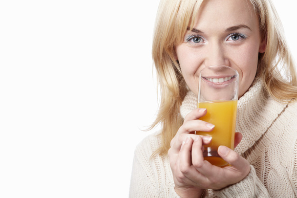 Woman drinking juice - Foto, afbeelding