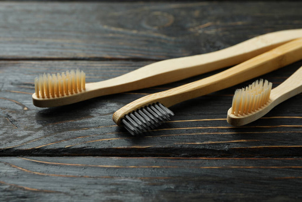 Eco friendly toothbrushes on rustic wooden background - Photo, Image