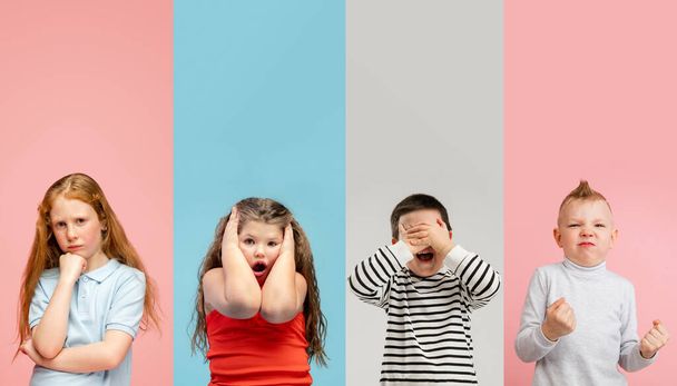 Art collage made of portraits of little and happy kids isolated on multicolored studio background. Human emotions, facial expression concept - Фото, изображение