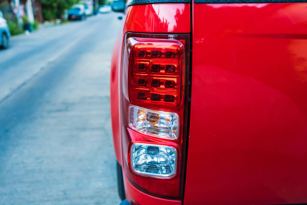 Close up Back view red tail lights of red pick-up - Foto, imagen